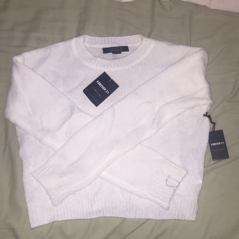 Cream colored sweater crop top.